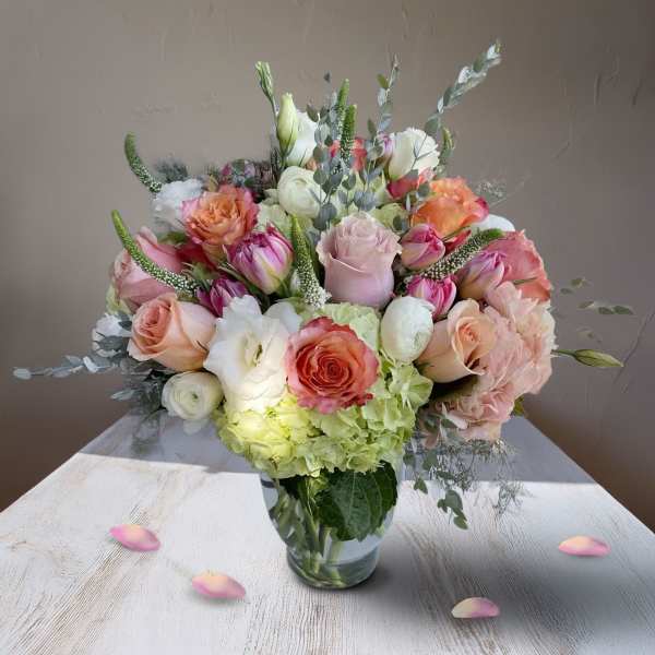 Mixed pastel bouquet in a clear glass vase