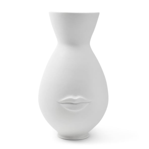 White sculptural vase with a face and lips