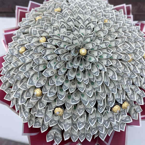 Bouquet made of folded dollar bills with gold-wrapped chocolates