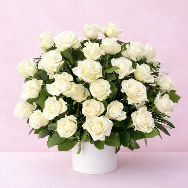 White rose bouquet in a white vase