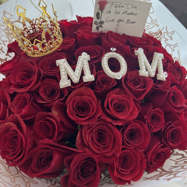 Bouquet of red roses with a gold crown and pearl "MOM" letters