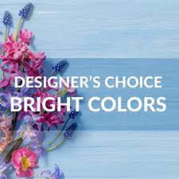Bright mixed flowers on a blue wooden background with text overlay