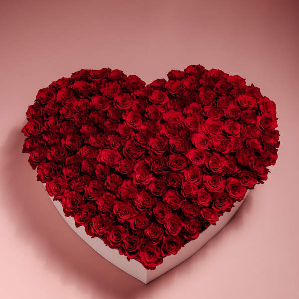 Heart-shaped box filled with red roses
