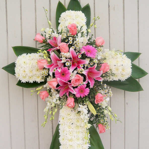 Cross-shaped floral spray with pink and white flowers