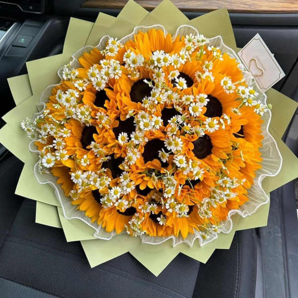 Bouquet of orange sunflowers with small white daisies