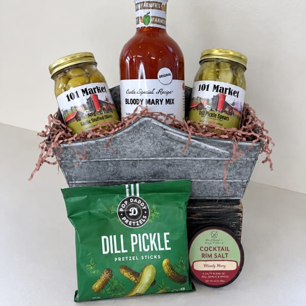 Gift basket with Bloody Mary mix, olives, pickles, pretzels, and cocktail salt
