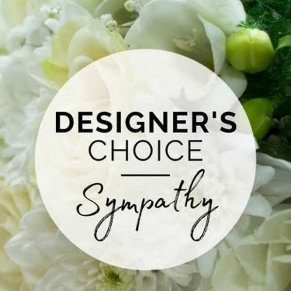 White sympathy floral arrangement with a designer's choice label