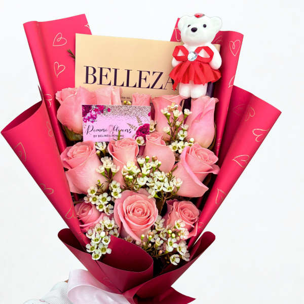 Pink rose bouquet with a teddy bear and ribbon wrap