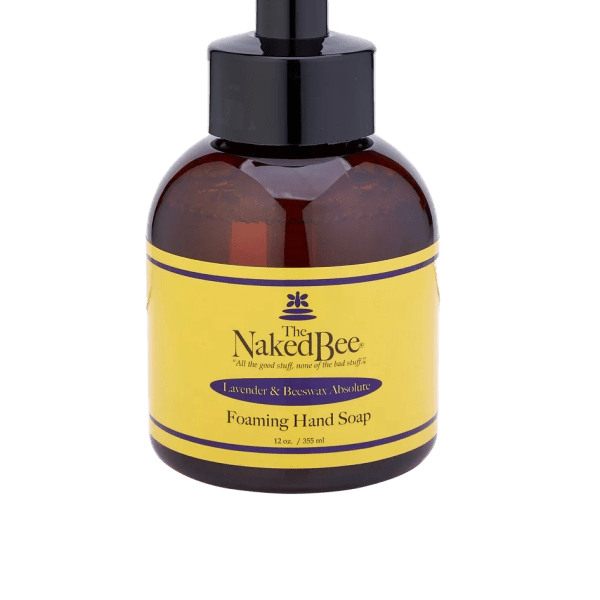 Amber foaming hand soap bottle with a black pump and yellow label