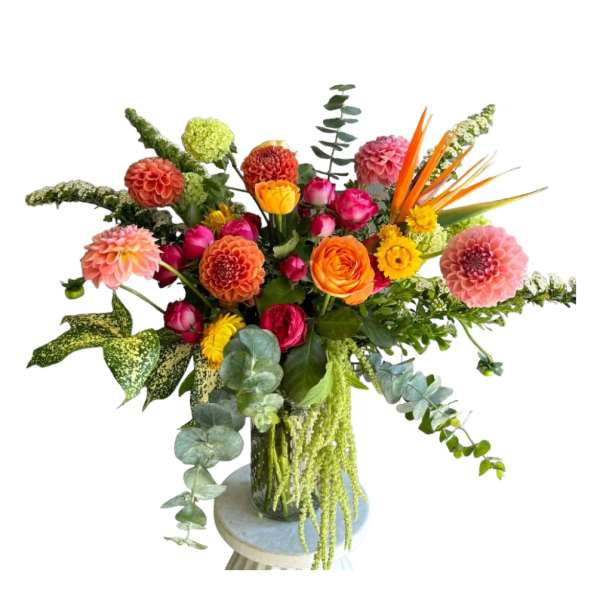 Colorful mixed flower arrangement in a glass vase