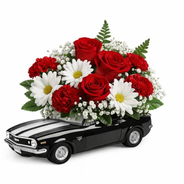 Red roses and white daisies arranged on a black toy car