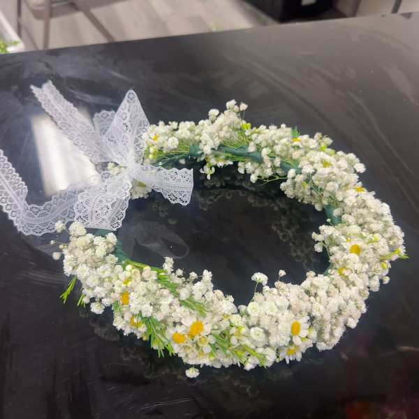 White floral crown with small daisies and lace ribbon
