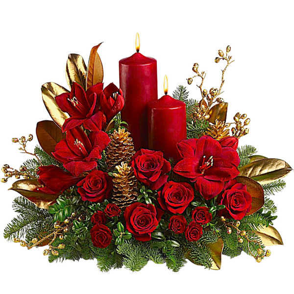 Red roses and amaryllis with two lit red candles in a holiday centerpiece