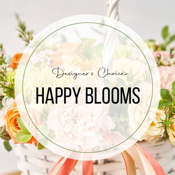 Mixed flower basket with a ribbon and "Happy Blooms" label