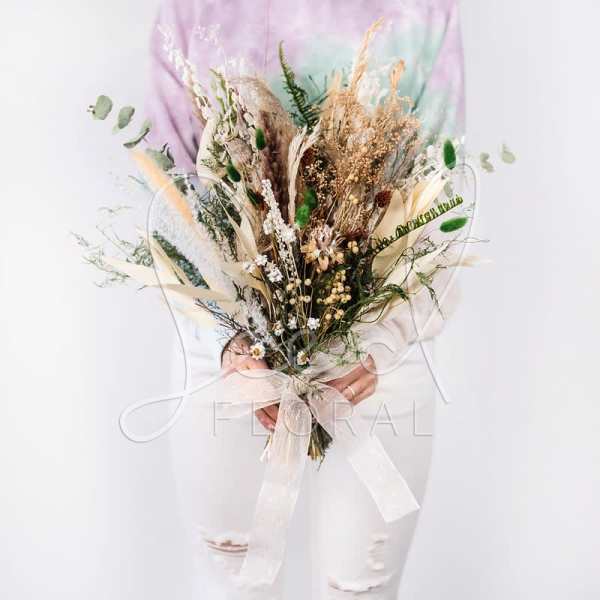 Dried flower bouquet with a sheer ribbon bow