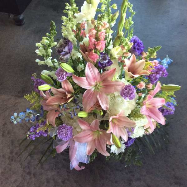 Tall mixed bouquet with pink lilies and purple flowers