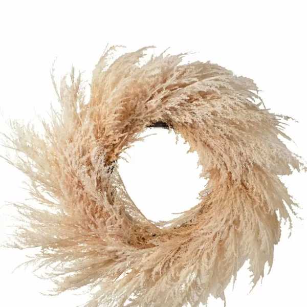 Beige dried grass wreath with a circular opening