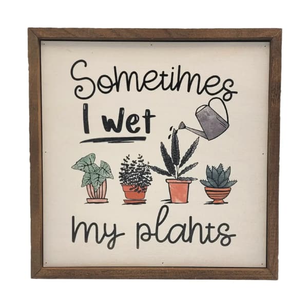 Framed sign with the words "Sometimes I wet my plants" and potted plant illustrations