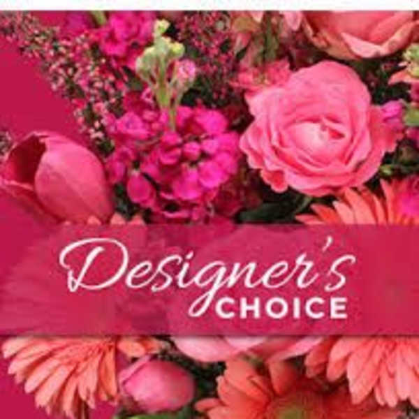 Pink floral arrangement with a "Designer’s Choice" label