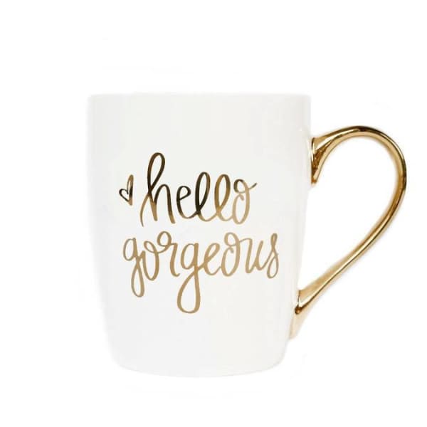 White mug with gold handle and gold "hello gorgeous" text