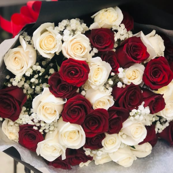 Shhhh,,Whispers of Love Hand wrap bouquet. looking to add or change to other color we will see what we can do for you, please call