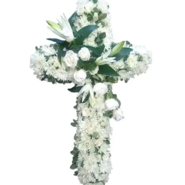 White floral cross arrangement with lilies and roses