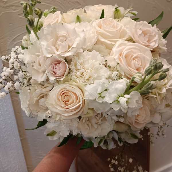 Cream rose and white hydrangea bouquet with baby's breath