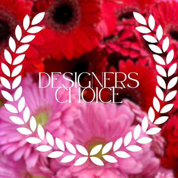 Blurred red and pink gerbera daisies with a white laurel graphic and text