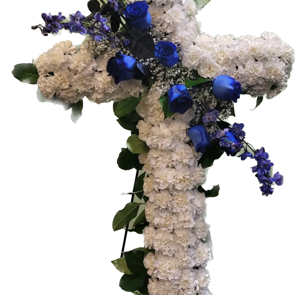 Cross-shaped floral arrangement with white carnations and blue roses
