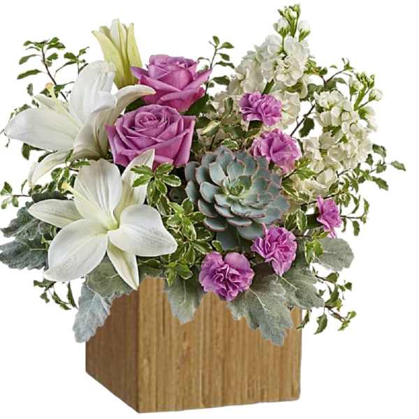 Pink roses and white lilies arranged in a wooden cube vase