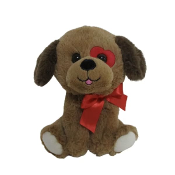 Brown plush dog with a red ribbon and heart-shaped eye patch