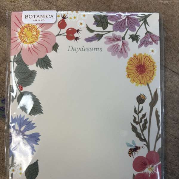 Floral stationery pad with pink, yellow, and purple flowers and butterflies