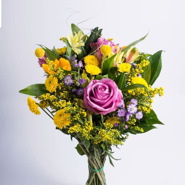 Hand-tied bouquet of pink, yellow, and purple flowers
