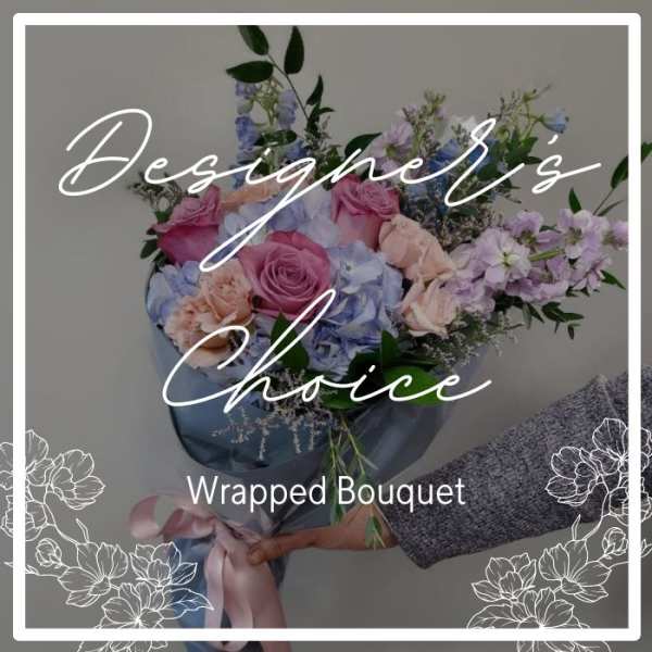 Wrapped bouquet of pastel roses and hydrangeas with lavender flowers