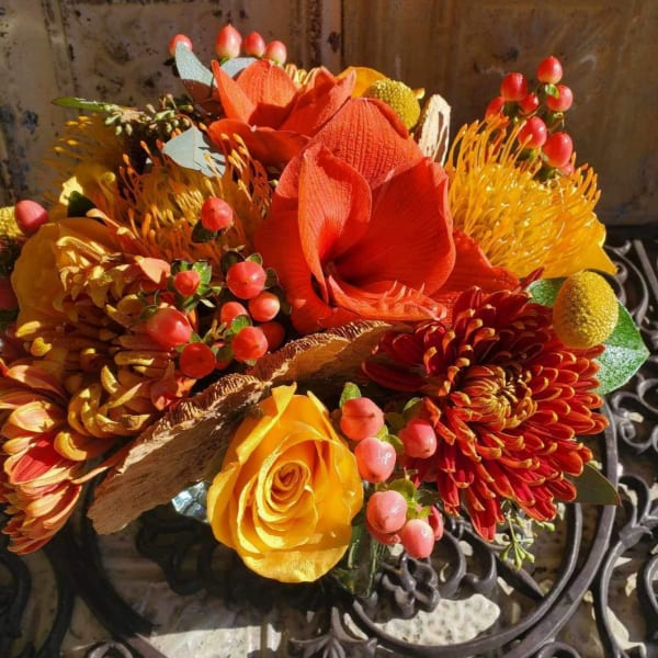 Orange and yellow bouquet with roses and mums