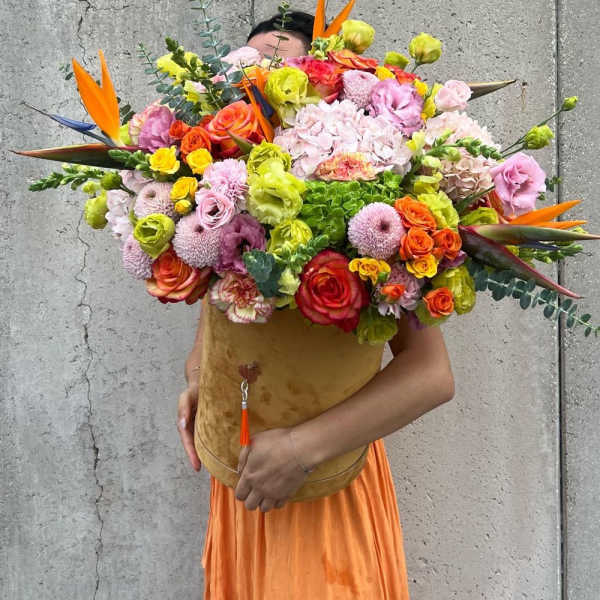 Large colorful bouquet with roses, hydrangeas, and bird of paradise flowers