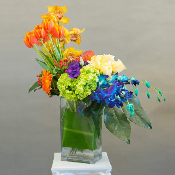 Colorful mixed bouquet in a clear glass vase