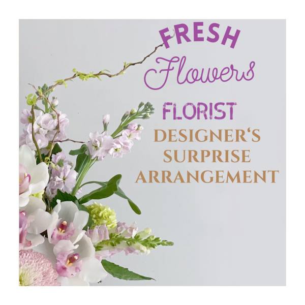 Pastel floral arrangement with orchids and pink blooms beside text