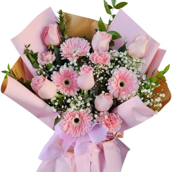 Pink rose and gerbera daisy bouquet wrapped in pastel paper