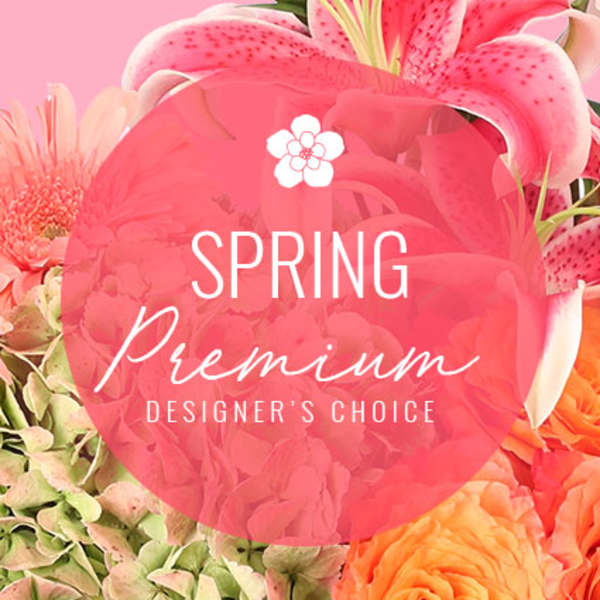 Spring premium designer's choice floral arrangement with pink lilies and orange blooms