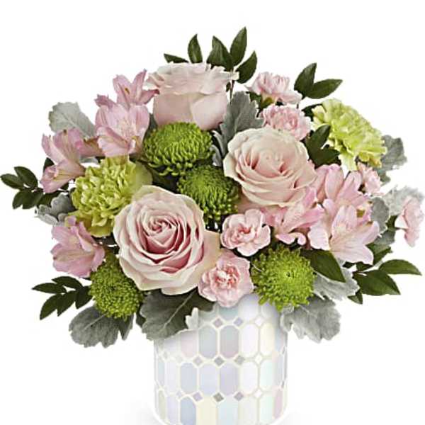 Pink roses and green mums in a patterned vase