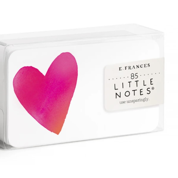 Boxed set of pink heart-shaped notes in clear plastic packaging