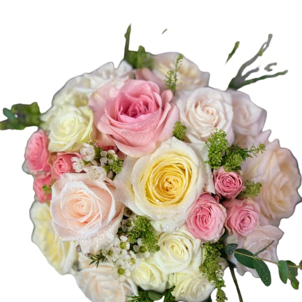 Bouquet of pink, cream, and yellow roses with greenery