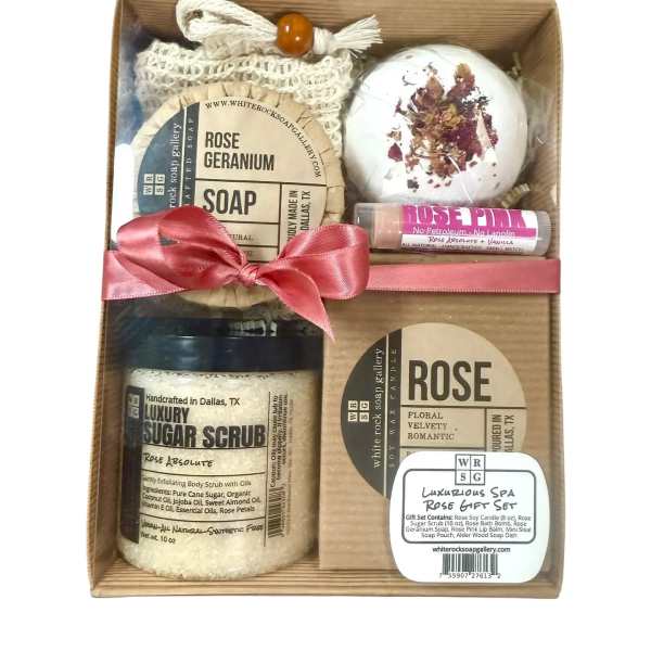 Gift box with rose-scented soap, bath bomb, sugar scrub, and lip balm