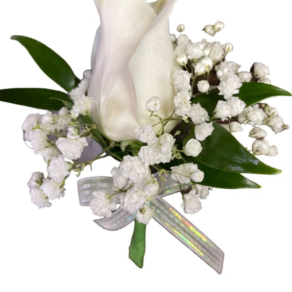 White rose boutonniere with baby's breath and a silver ribbon
