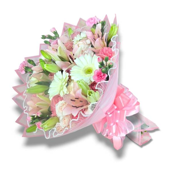 Pink and white bouquet with lilies, daisies, and roses wrapped in pink paper