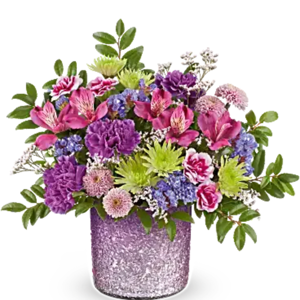Mixed bouquet in a glittery purple vase with pink, purple, and green flowers