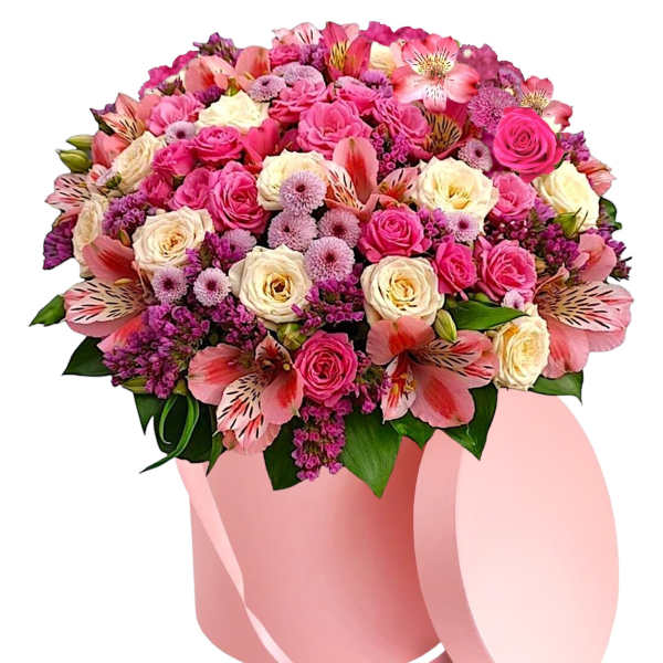 Pink and cream rose bouquet in a pink hat box