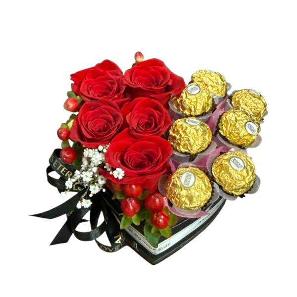 Red roses with gold-wrapped chocolates in a heart-shaped box