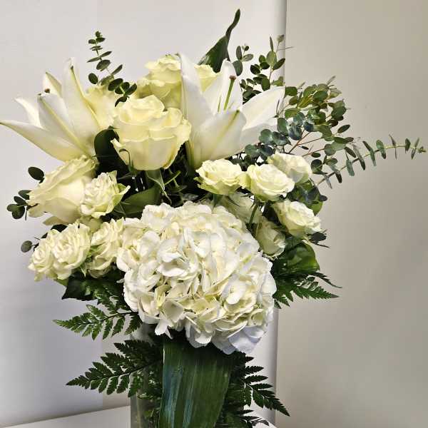 White arrangement with white roses